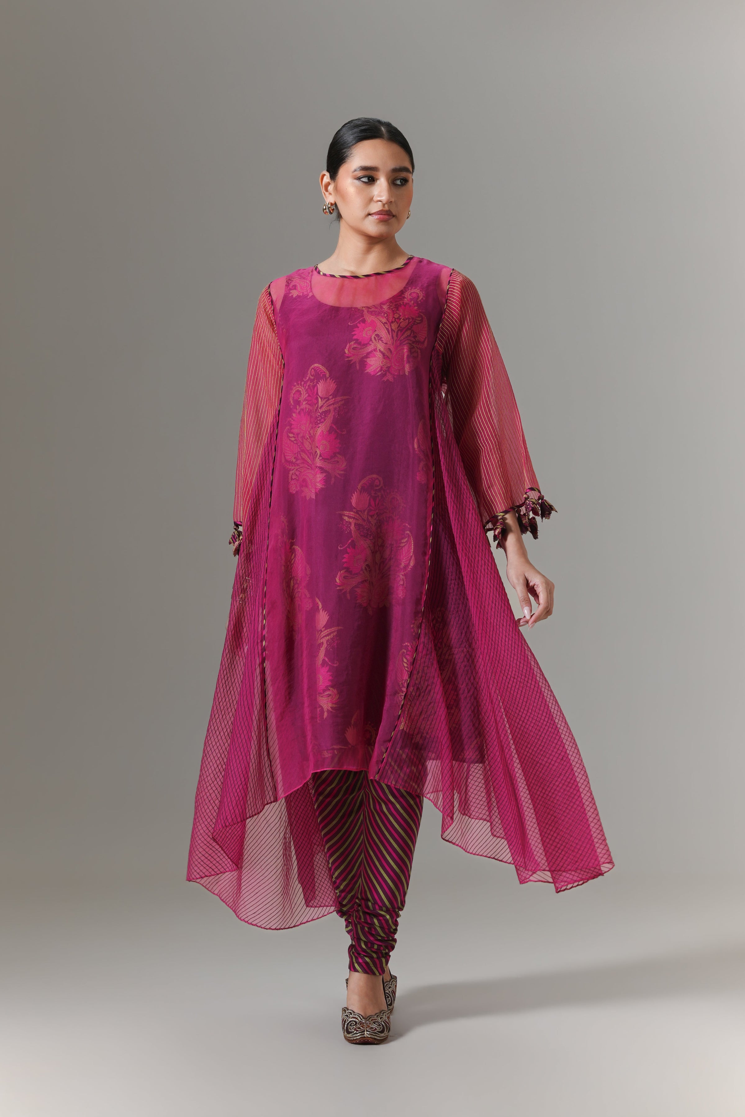 Organza quilted kali kurta with paisley buta chanderi slip, churidar and dupatta.