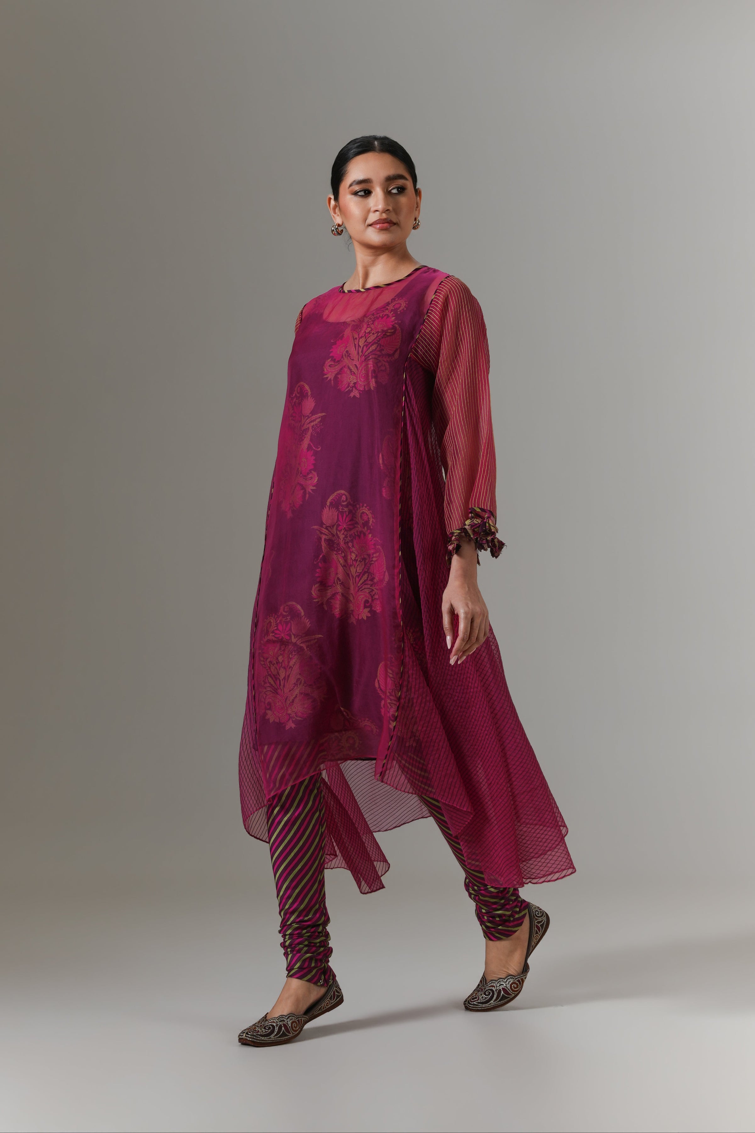 Organza quilted kali kurta with paisley buta chanderi slip, churidar and dupatta.