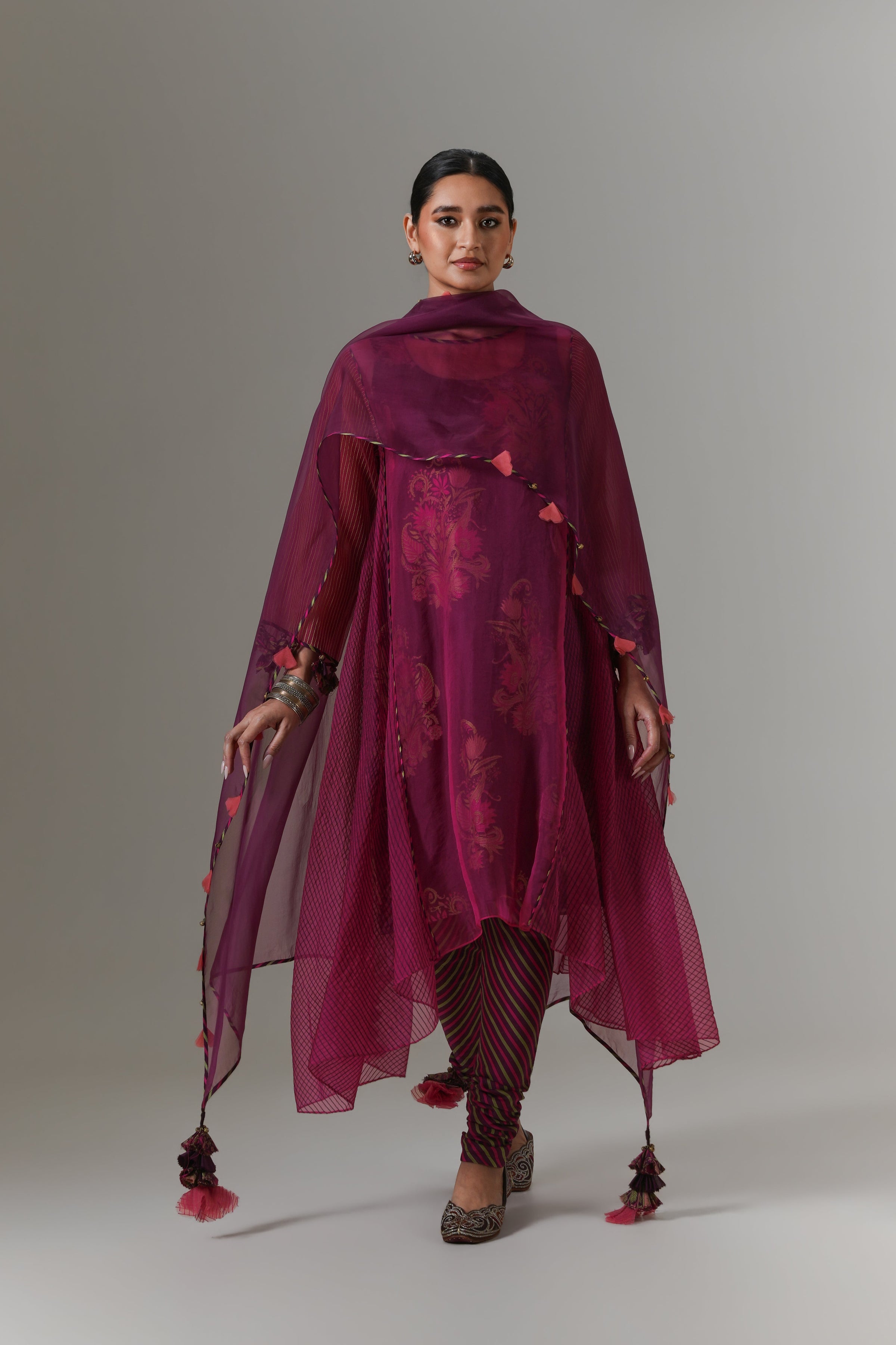 Organza quilted kali kurta with paisley buta chanderi slip, churidar and dupatta.