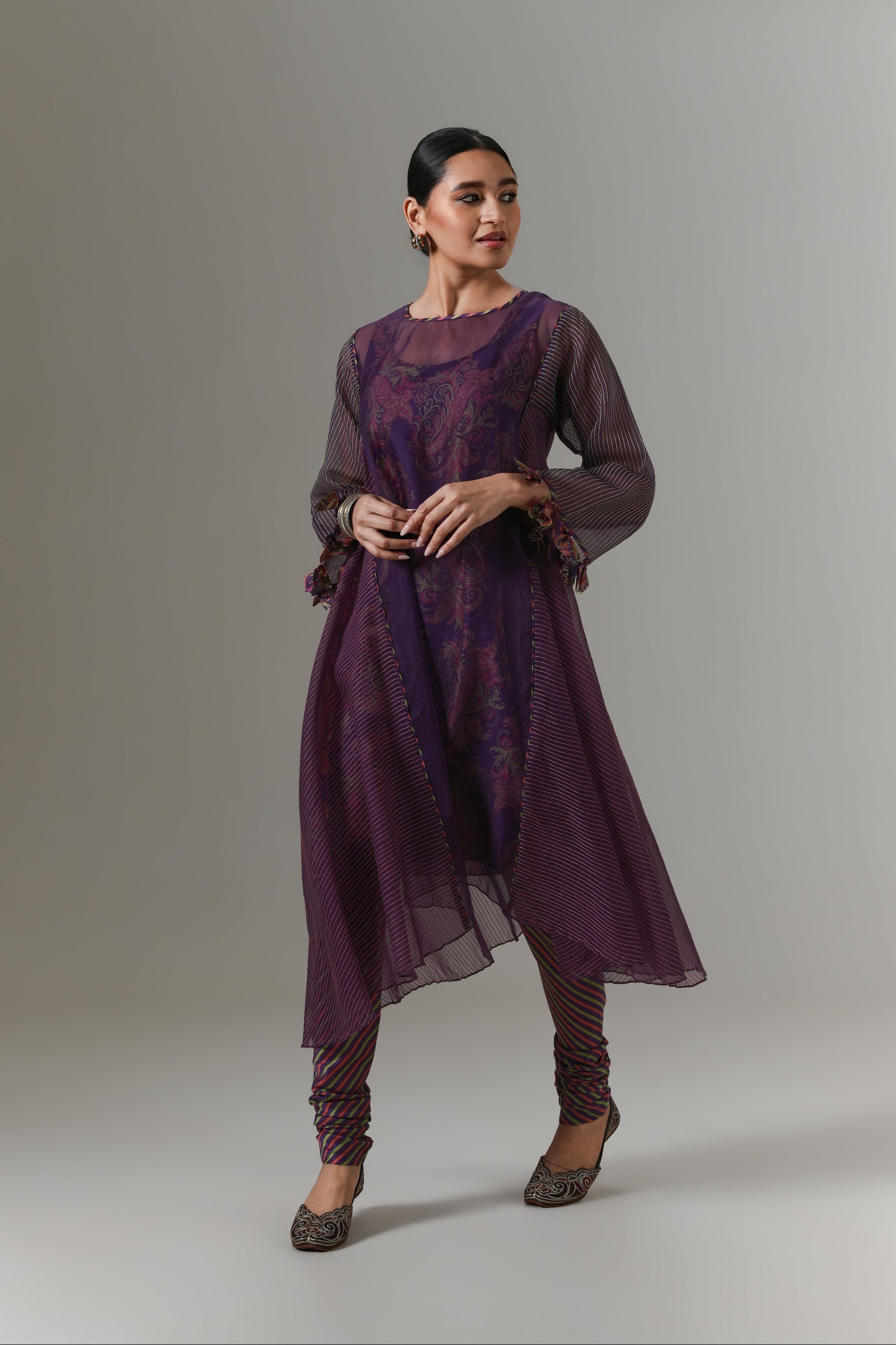 Organza quilted kali kurta with all-over paisley chanderi slip, churidar and dupatta.