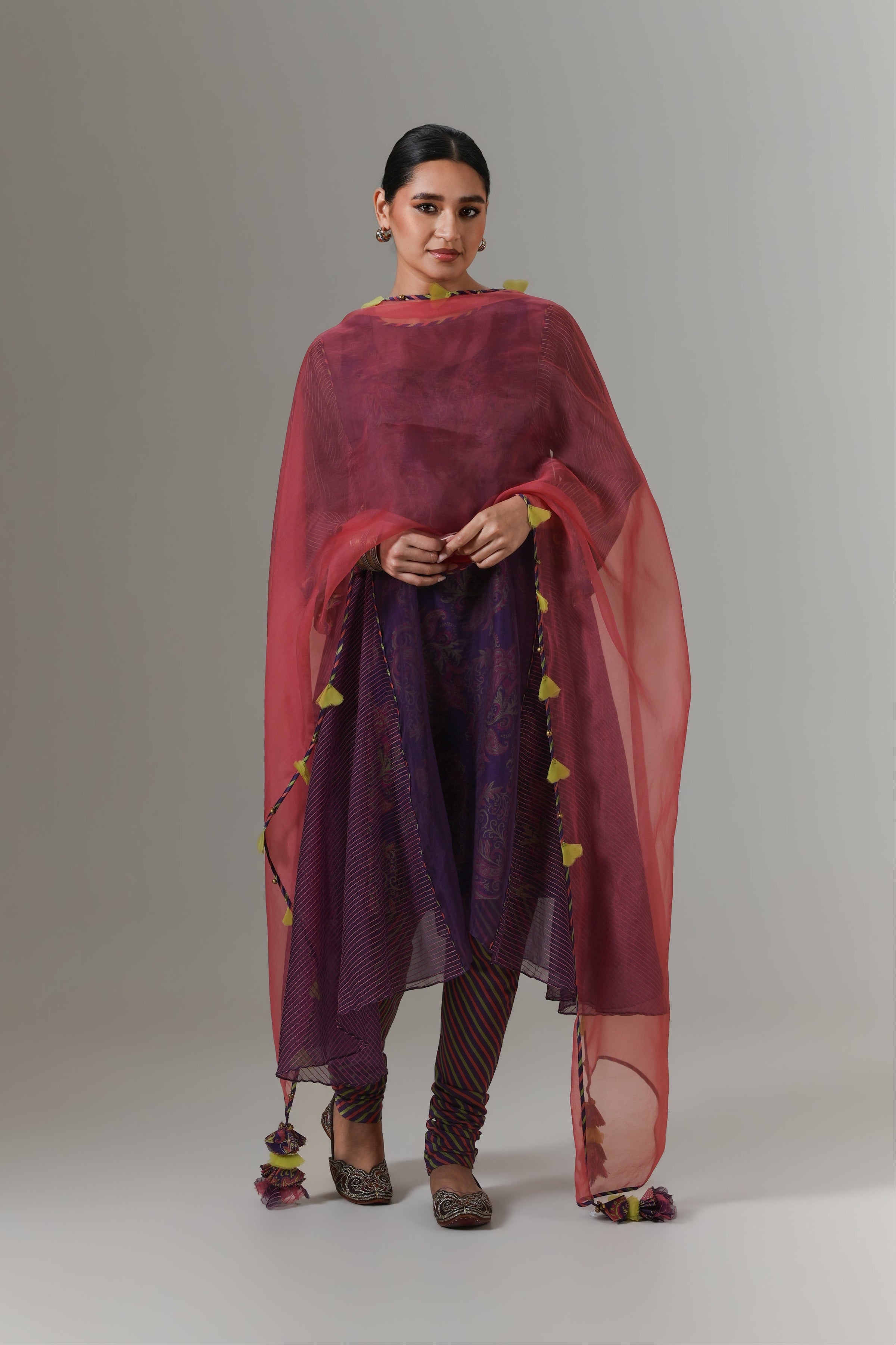 Organza quilted kali kurta with all-over paisley chanderi slip, churidar and dupatta.