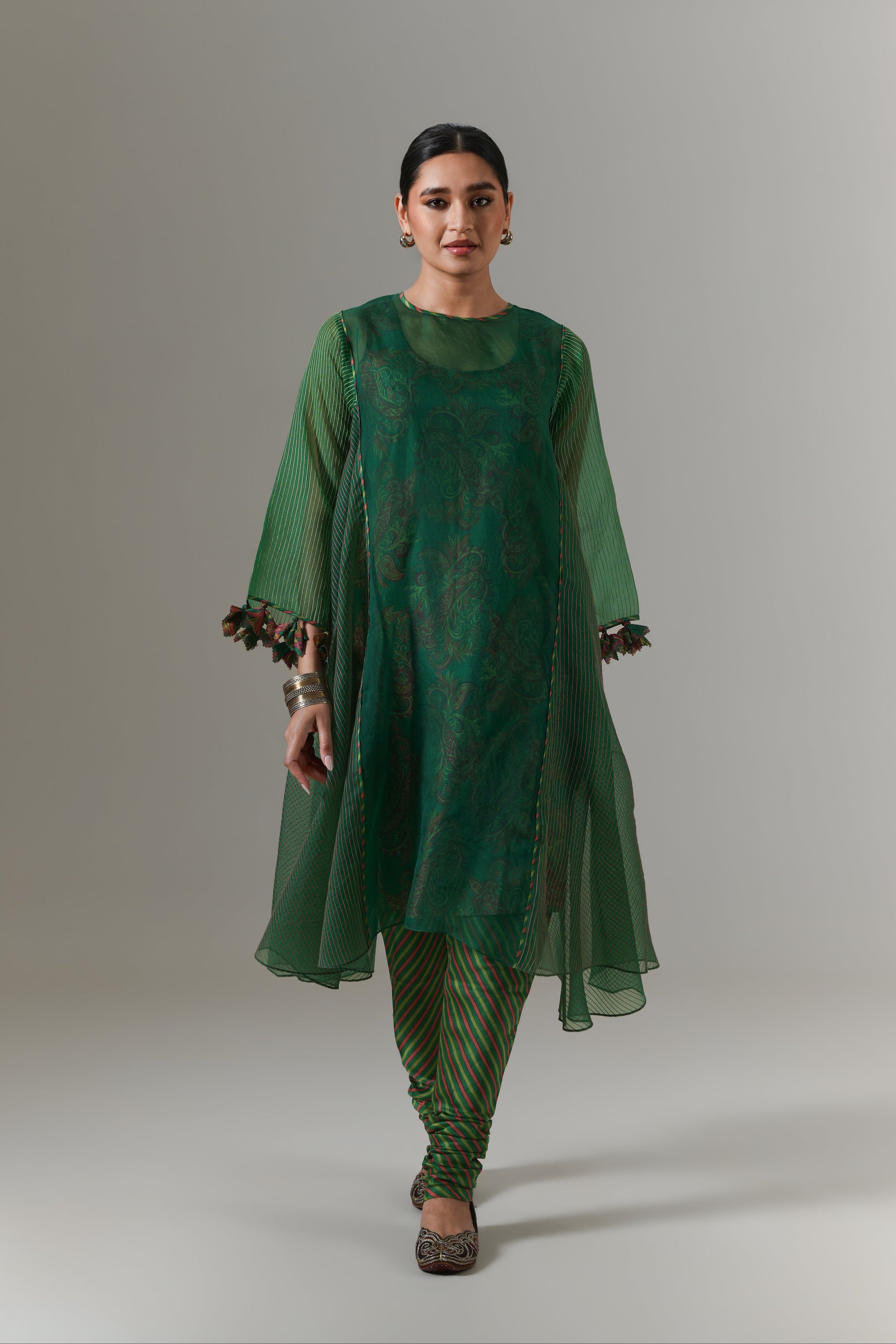 Organza quilted kali kurta with all-over paisley chanderi slip, churidar and dupatta.