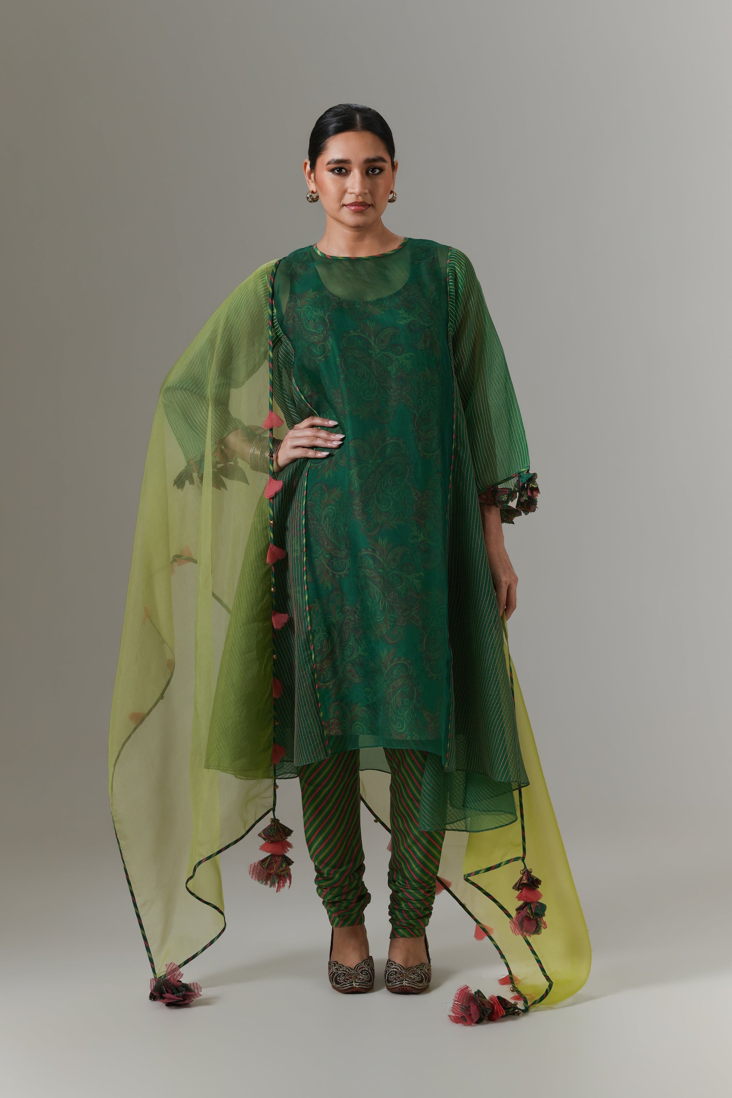 Organza quilted kali kurta with all-over paisley chanderi slip, churidar and dupatta.