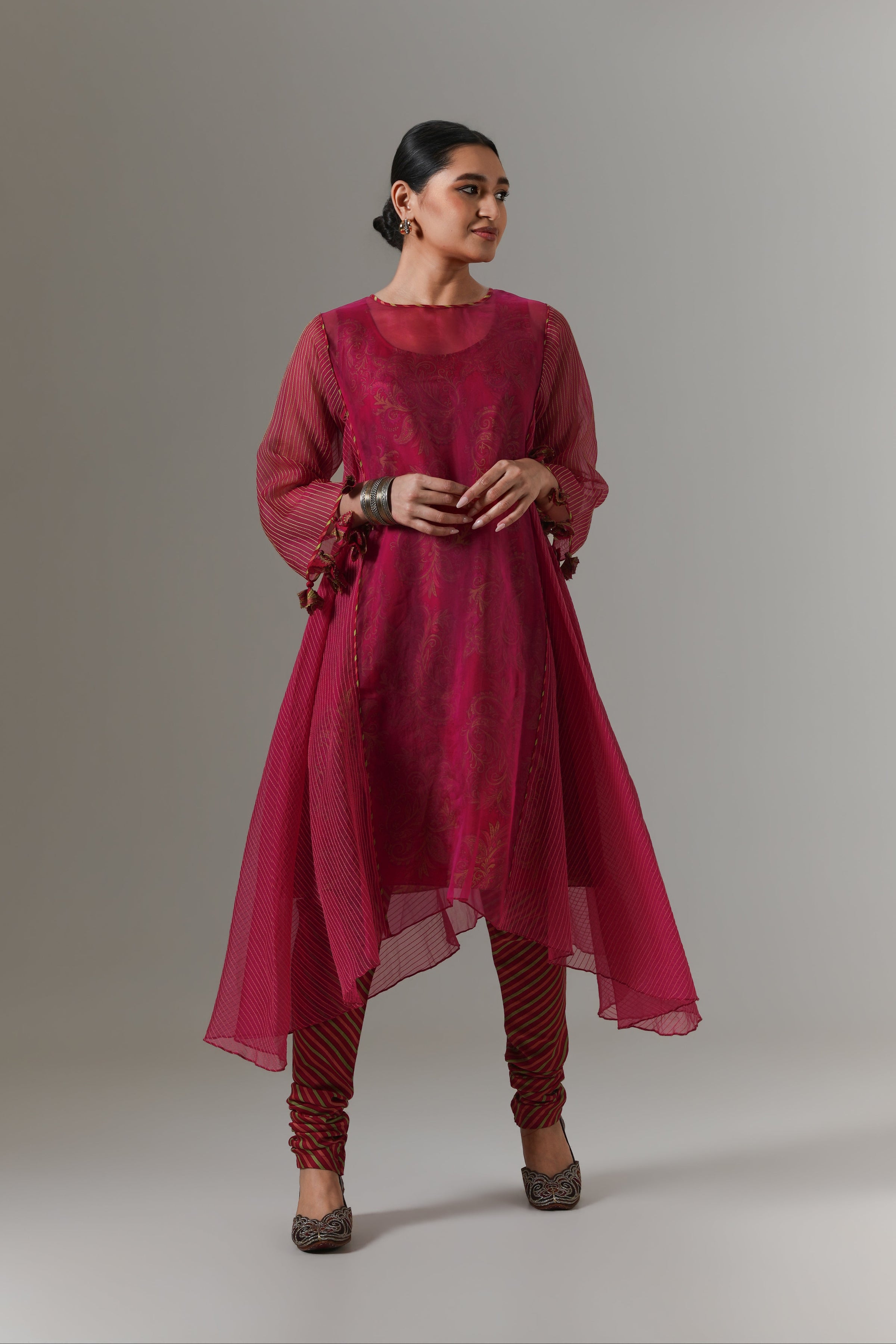 Organza quilted kali kurta with all-over paisley chanderi slip, churidar and dupatta.