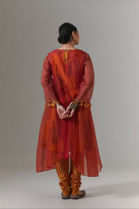 Organza quilted kali kurta with paisley buta chanderi slip, churidar and dupatta.