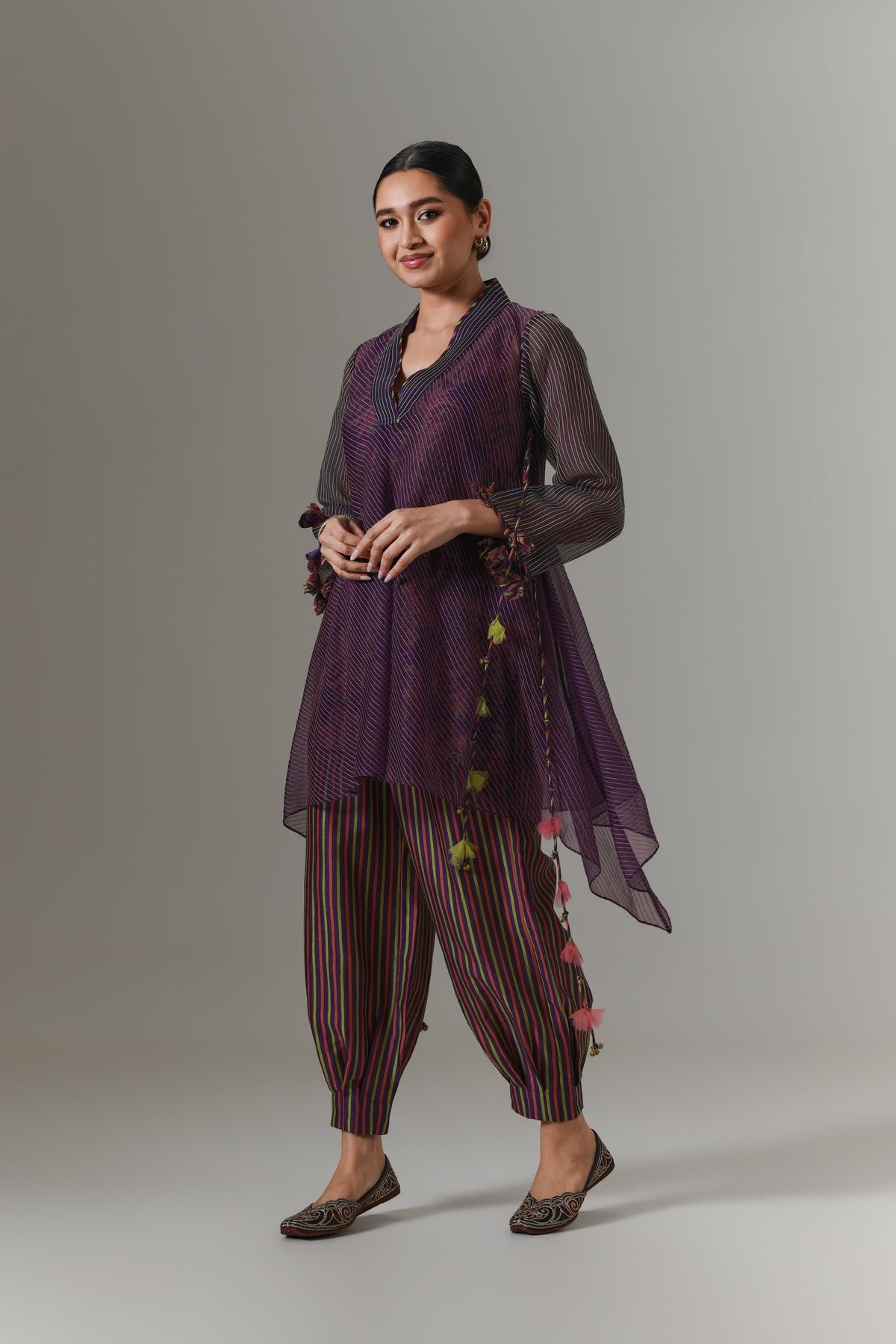 Organza quilted bias-cut kurta with all-over paisley chanderi slip, and balloon pants.